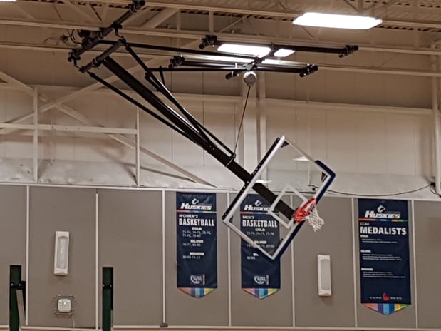 side-folding-ceiling-suspended-basketball-system