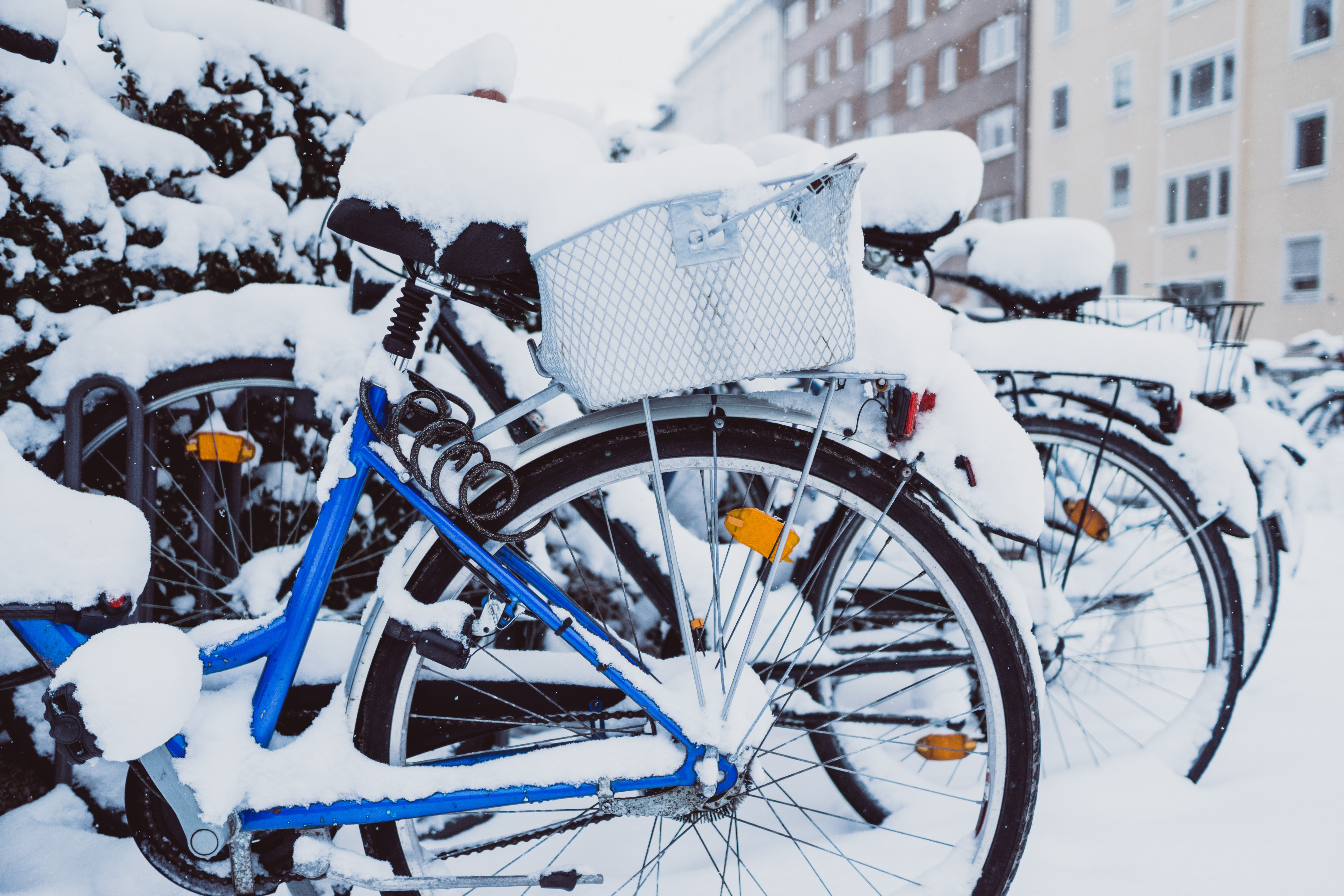 bicycles-in-snow-near-houses-2021-10-13-04-01-40-utc