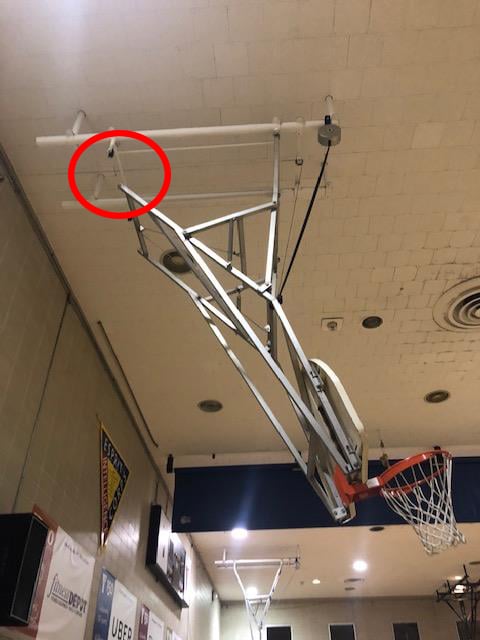 ceiling-suspended-basketball-system-in-need-of-repair copy