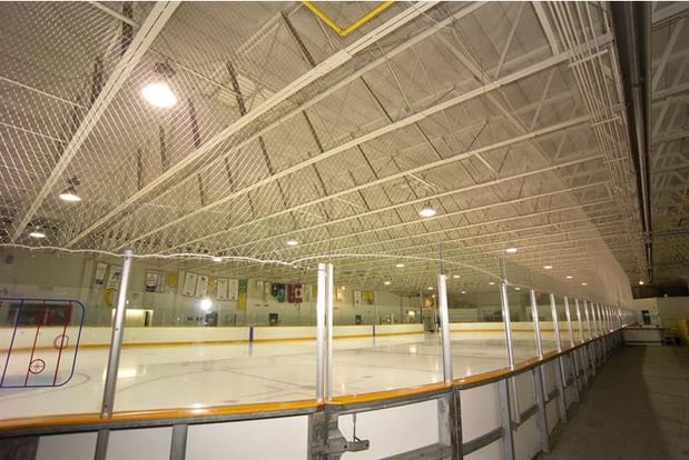 hockey-arena-safety-netting-above-glass.jpg