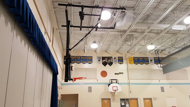 side-view-cieling-suspended-basketball-system-ecole-carrefour-jeunesse.jpg