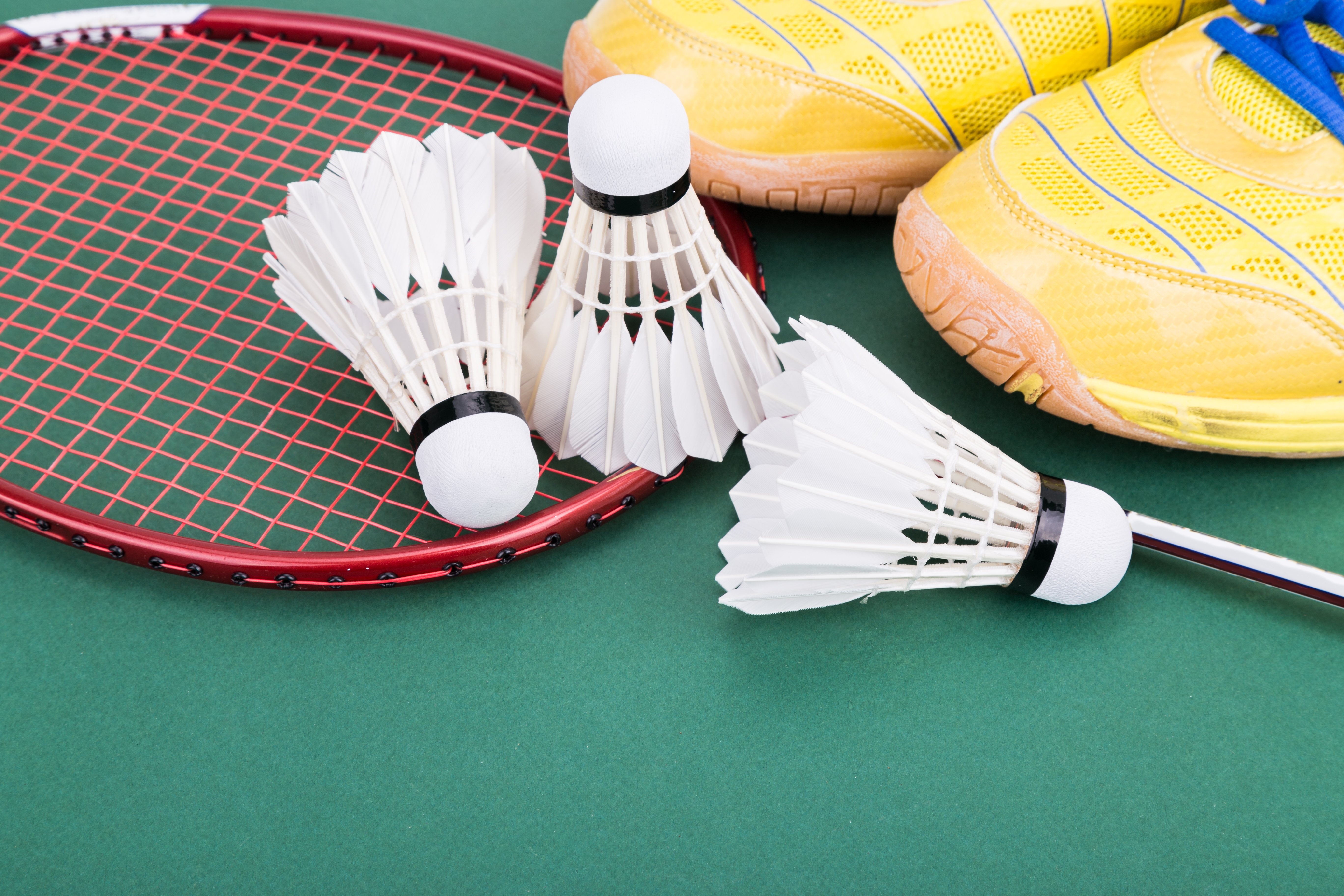 three-badminton-shuttlecock-with-racket-and-shoes-2021-09-01-20-56-06-utc