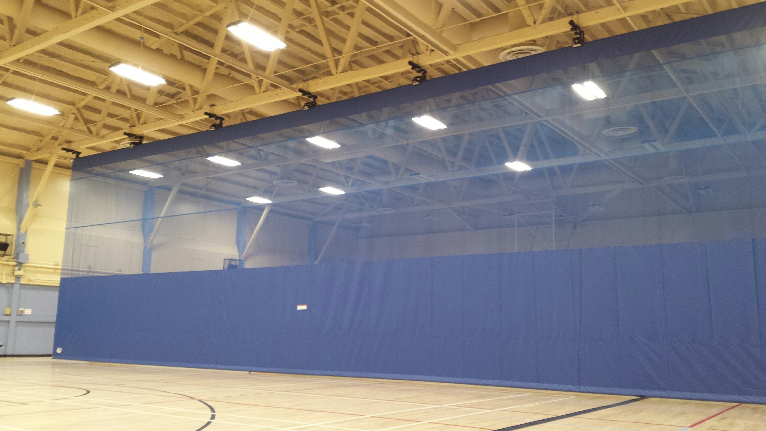 A TopRoll Gym Divider Curtain for 22 Wing CFB North Bay
